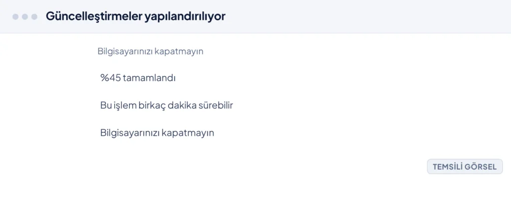 Temsili görsel: Windows 11 yeniden başlatma sonrası çıkan koyu renkli tam ekran güncelleme tamamlama ekranı; ortada dönen yükleniyor simgesi ve altında yüzde ilerleme göstergesi ( tamamlandı), altı