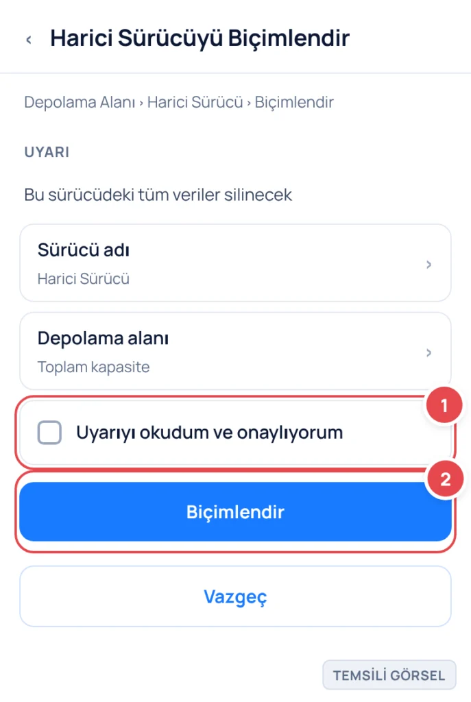 Temsili görsel: Harici sürücü biçimlendirme onay ekranı; uyarı metni ve işaretli öğeler görünür; işaretli: 1. Uyarıyı okudum ve onaylıyorum onay kutusu, 2. Biçimlendir düğmesi