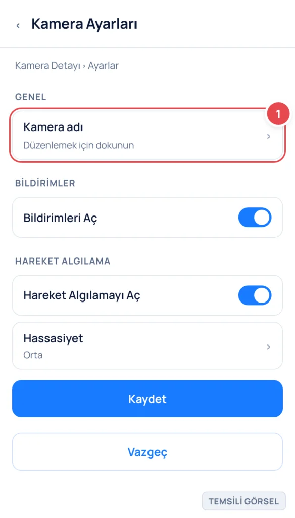 Temsili görsel: Kamera Ayarları ekranı; Genel başlığı altında Kamera adı satırı, Bildirimler başlığı altında Bildirimleri Aç anahtarı, Hareket Algılama başlığı altında Hareket Algılamayı Aç anahtarı v